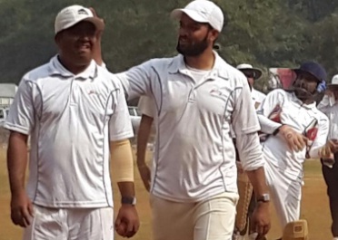 Dinesh Juvekar in left side (Godrej Staff Team) 5 wkts and notout 30 runs