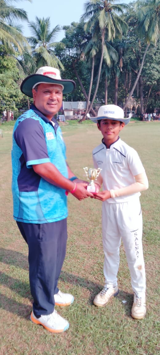 Coach Niraj Singh and Man of the Match Meet Yadav
